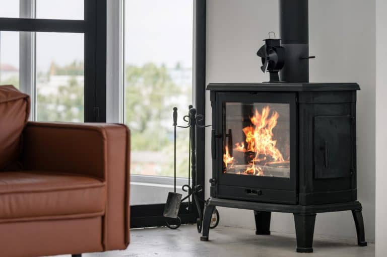 open fireplace using firewood to keep home warm